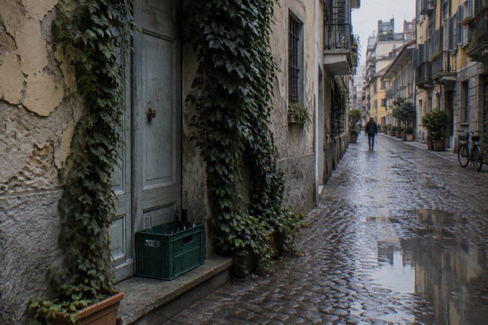 A quiet lane in the Brera quarter with ivy-covered walls and a vintage bicycle leaning against a painted door