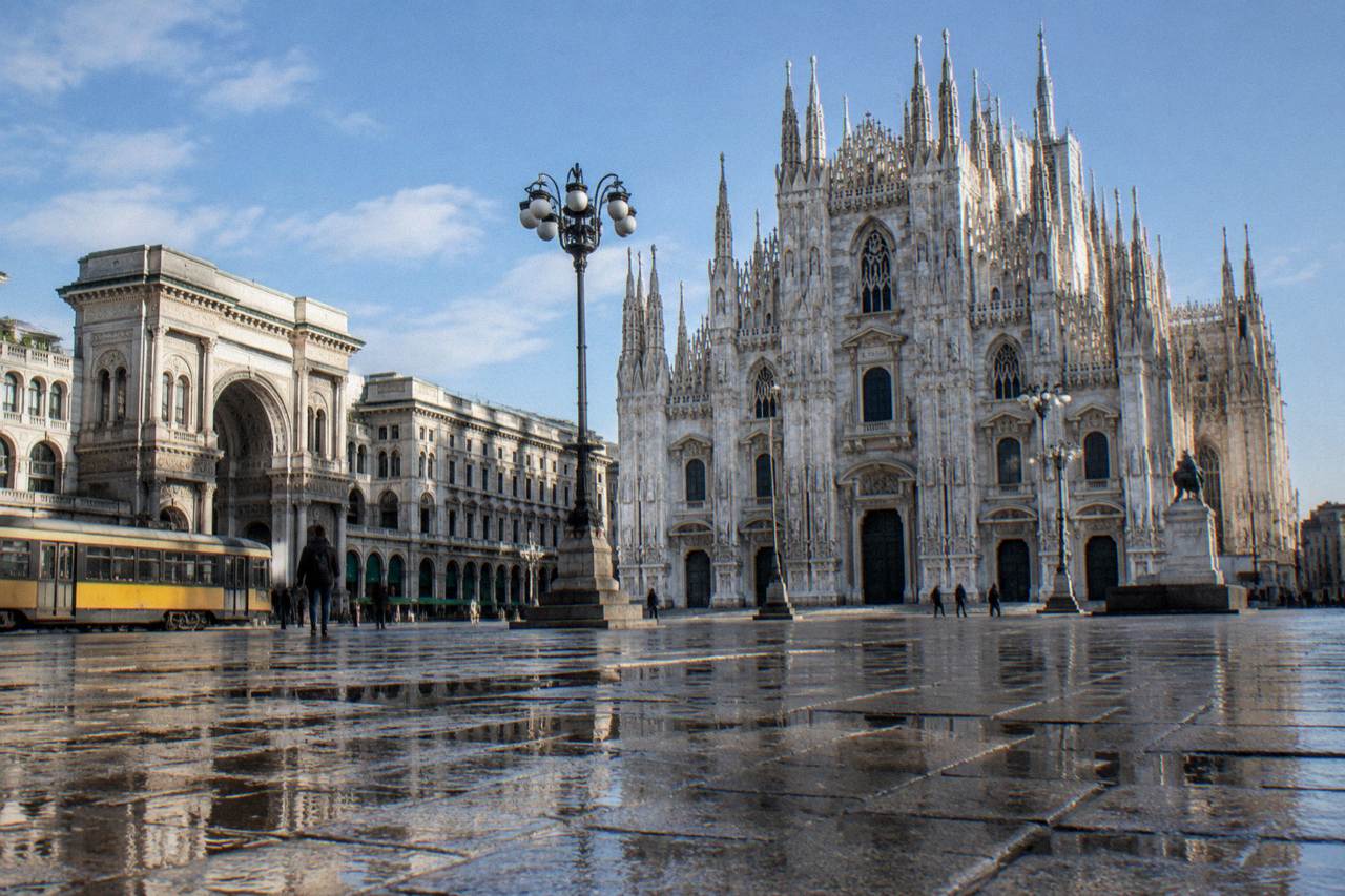 Milan Cathedral facade seen from Piazza del Duomo on a clear morning