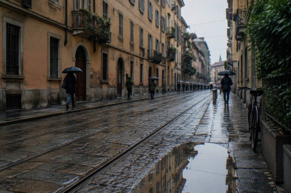 Narrow Milan street with tram tracks and old apartment buildings