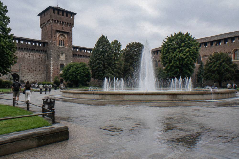 Sforza Castle courtyard with stone walls and the central fountain