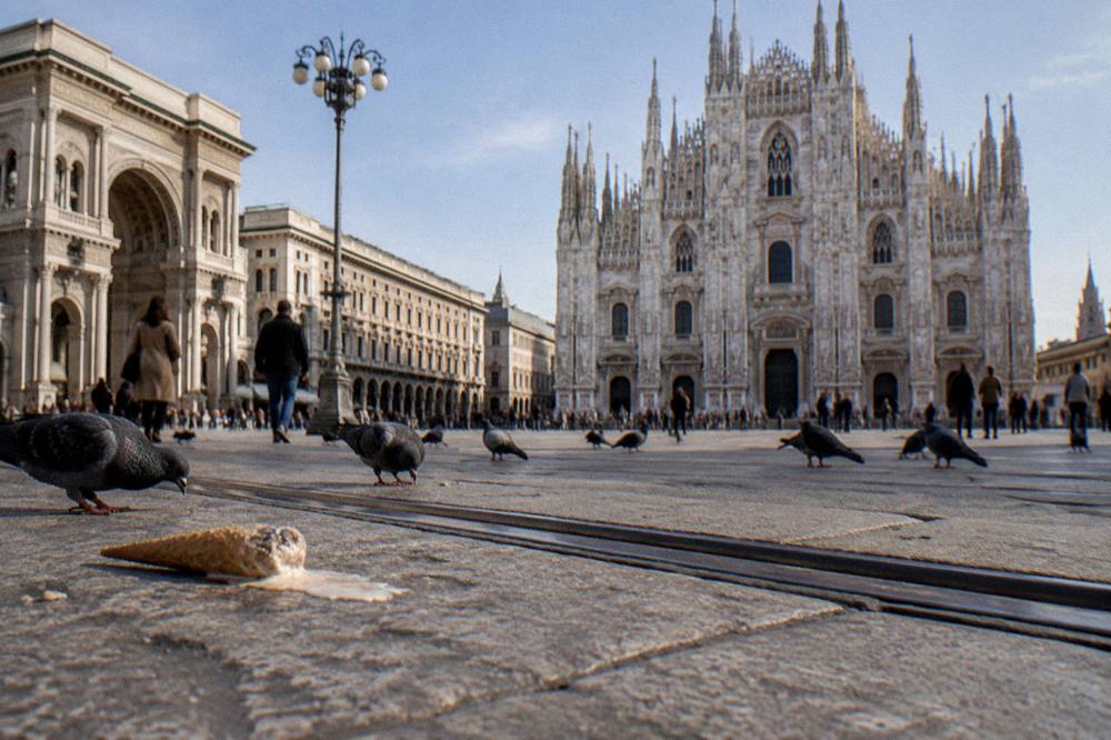 Milan cathedral facade and piazza seen from across the square